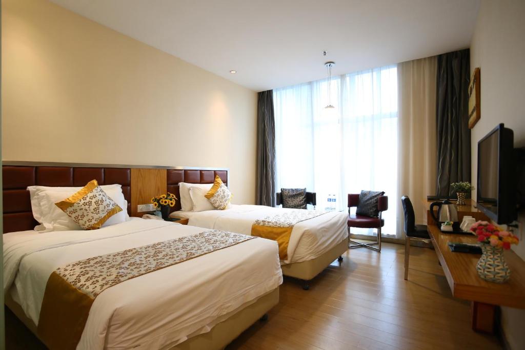 Двухместный (Стандартный двухместный номер с 2 отдельными кроватями) отеля Shanshui Trends Hotel East Station, Гуанчжоу