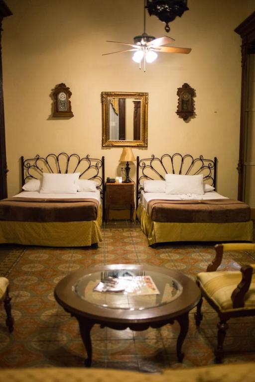 Сьюит (Представительский двухместный люкс с 1 кроватью) отеля El Gran Hotel, Мерида