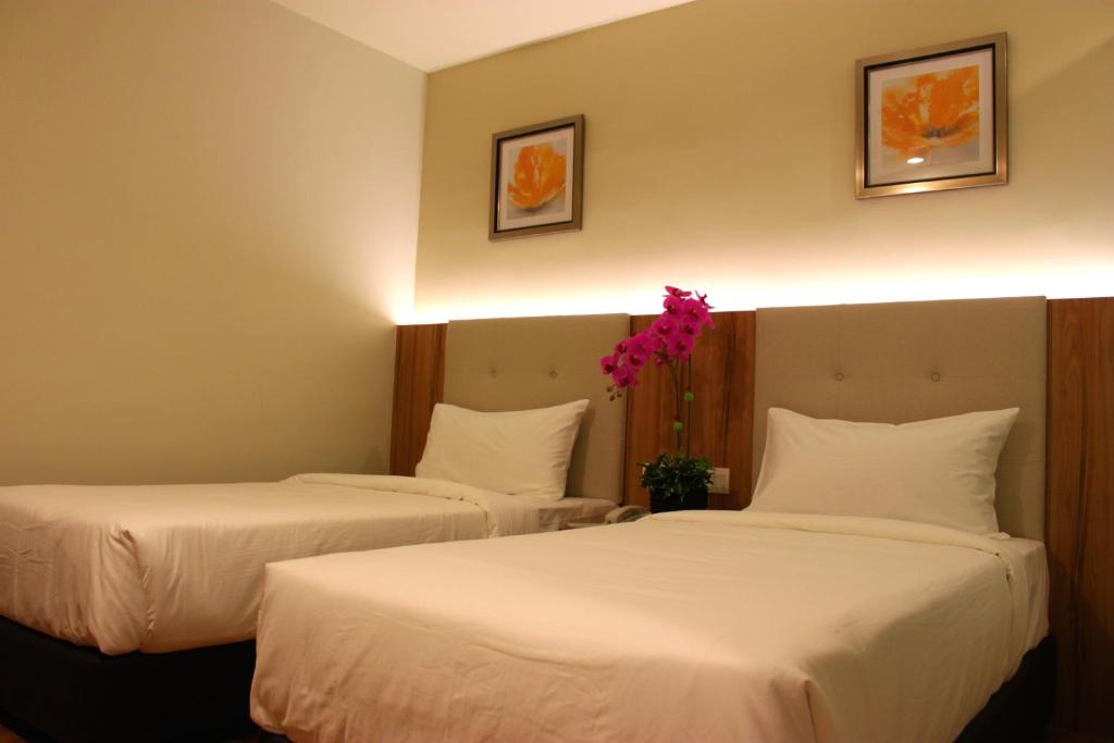 Двухместный (Стандартный двухместный номер с 2 отдельными кроватями, без окна) отеля BIG M Hotel, Куала-Лумпур
