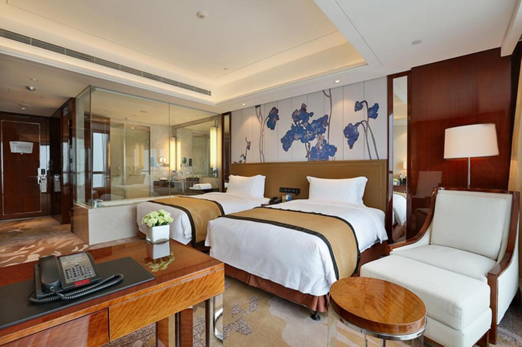 Двухместный (Представительский двухместный номер с 2 отдельными кроватями) отеля Minyoun Chengdu Dongda Hotel, Чэнду