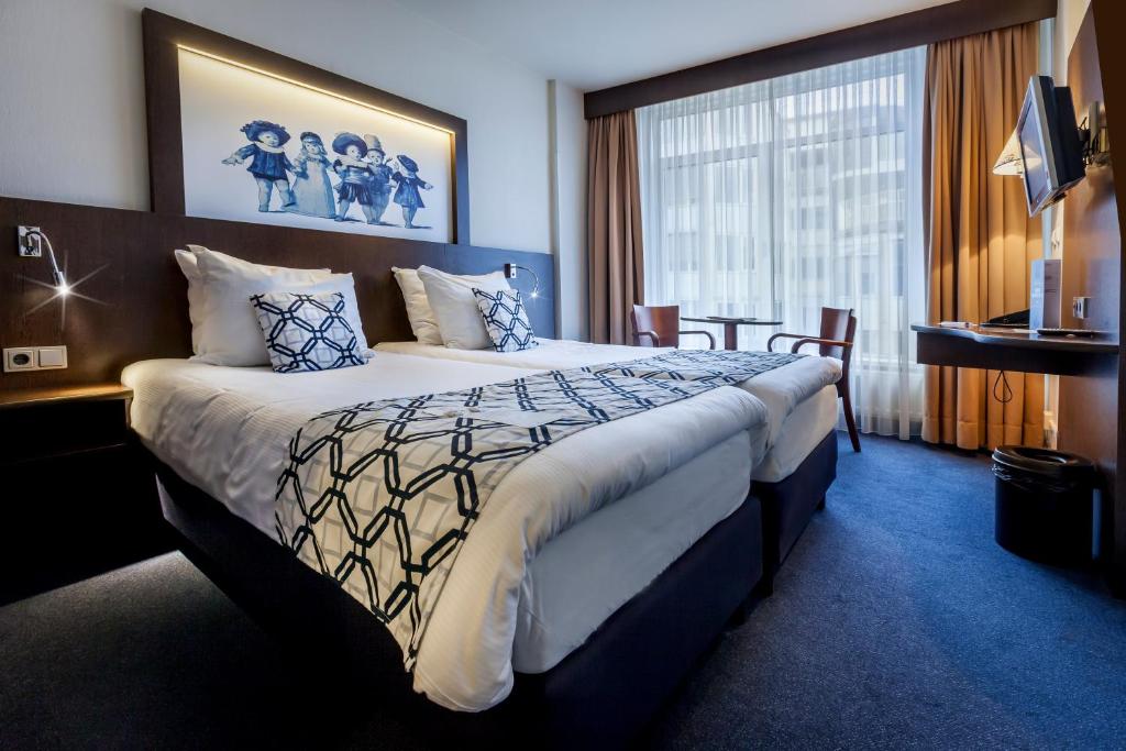 Двухместный (Двухместный номер с 2 отдельными кроватями) отеля Hotel Die Port van Cleve, Амстердам