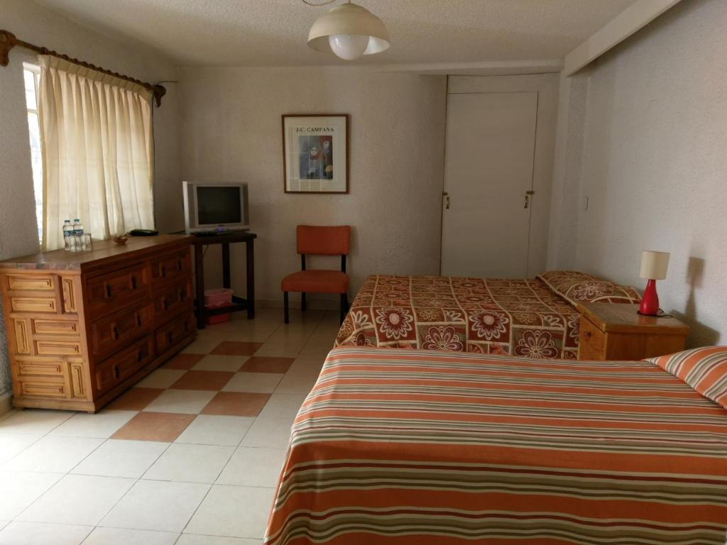 Двухместный (Двухместный номер с 2 отдельными кроватями) гостевого дома Anys Hostal, Мехико
