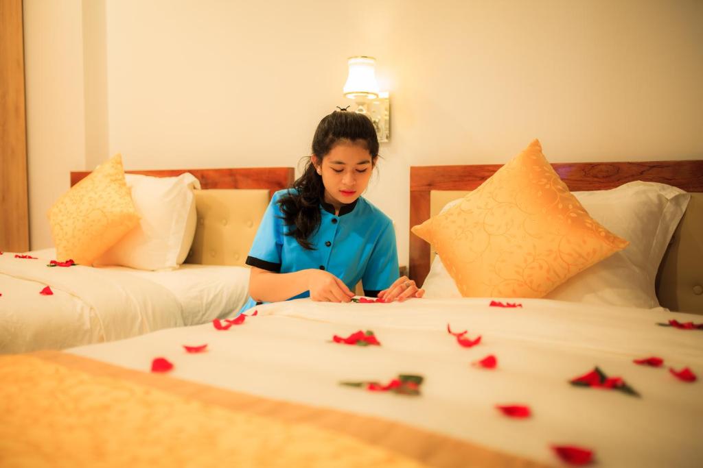 Двухместный (Двухместный номер Делюкс с 2 отдельными кроватями) отеля Cherry Hotel Hue, Хюэ