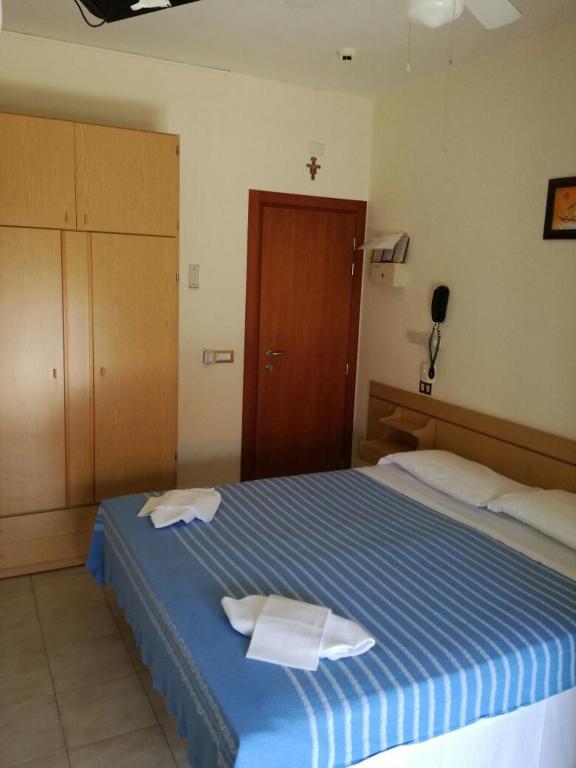 Двухместный (Двухместный номер с 1 кроватью или 2 отдельными кроватями) отеля Hotel AnnaMare, Римини