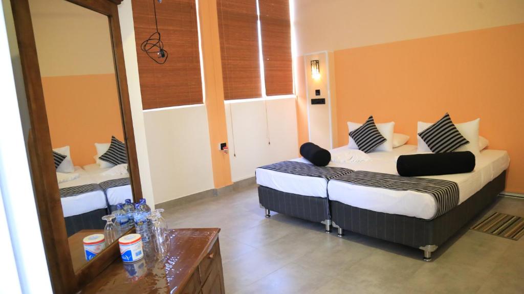 Двухместный (Двухместный номер с 1 кроватью или 2 отдельными кроватями и собственной ванной комнатой) гостевого дома Kandy City Rooms & Hostel, Канди
