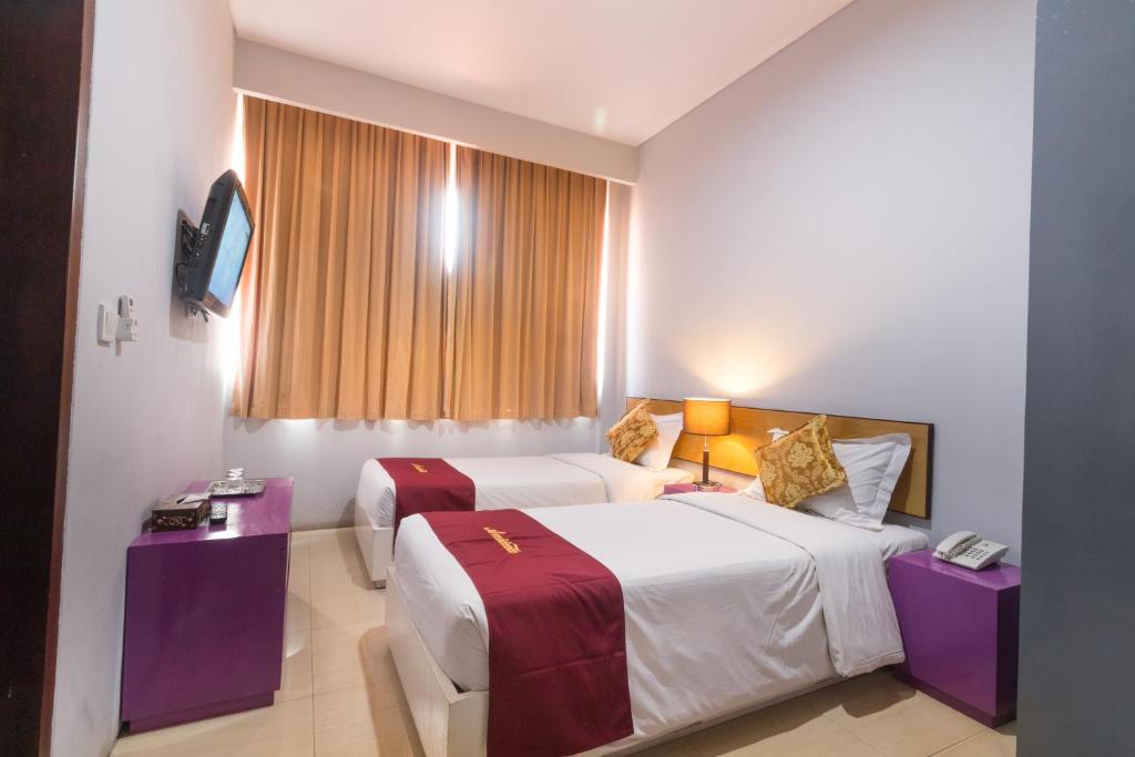 Двухместный (Улучшенный двухместный номер с 1 кроватью или 2 отдельными кроватями) отеля A Residence, Кута