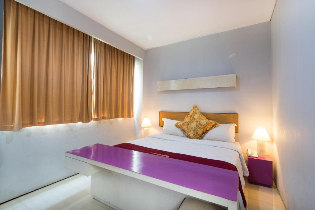 Двухместный (Улучшенный двухместный номер с 1 кроватью или 2 отдельными кроватями, вид на город) отеля A Residence, Кута