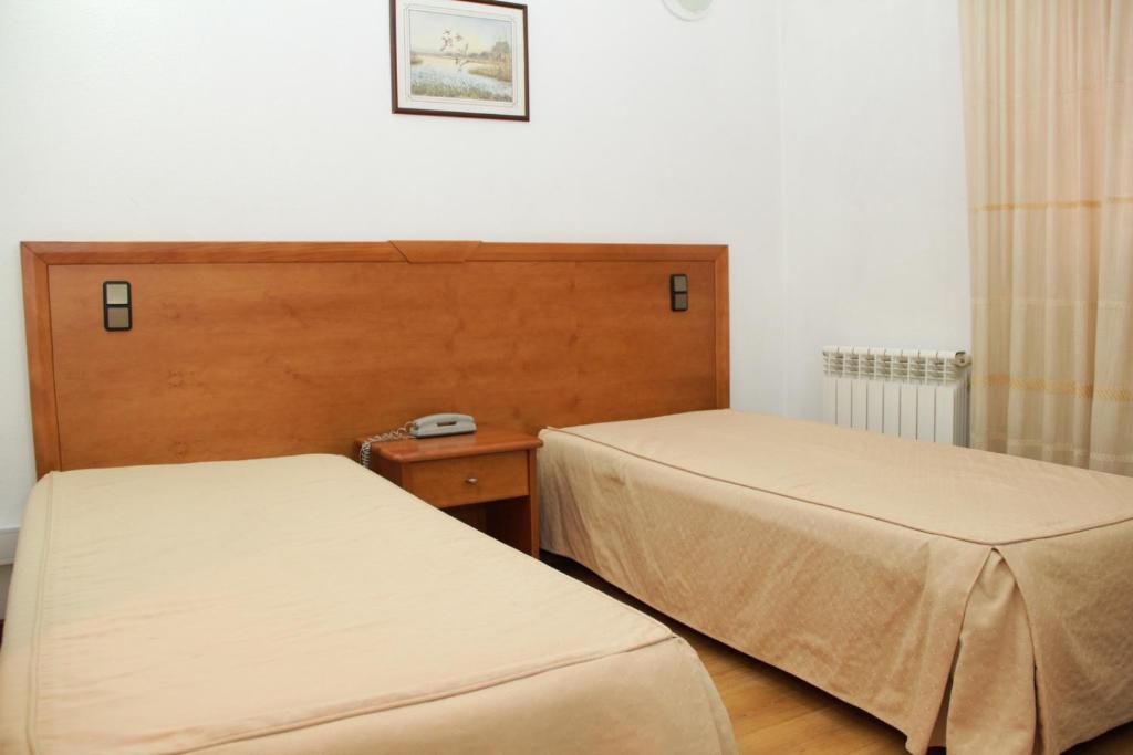 Двухместный (Двухместный номер с 2 отдельными кроватями) отеля Residencial Parque, Визеу