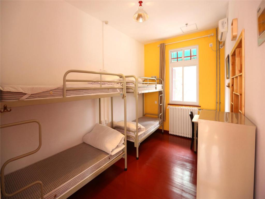 Номер (Спальное место на двухъярусной кровати в общем номере для женщин) хостела Wheat Youth Hostel, Циндао