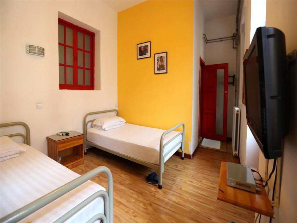 Двухместный (Бюджетный двухместный номер с 2 отдельными кроватями) хостела Wheat Youth Hostel, Циндао