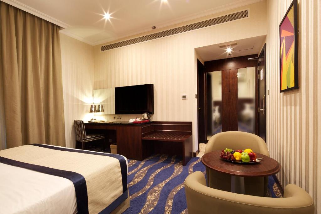 Двухместный (Стандартный двухместный номер с 1 кроватью или 2 отдельными кроватями) отеля Raviz Center Point Hotel, Дубай