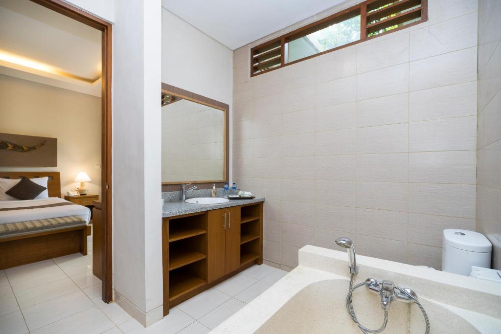 Двухместный (Улучшенный двухместный номер с 1 кроватью или 2 отдельными кроватями), Desak Putu Putera Cottages