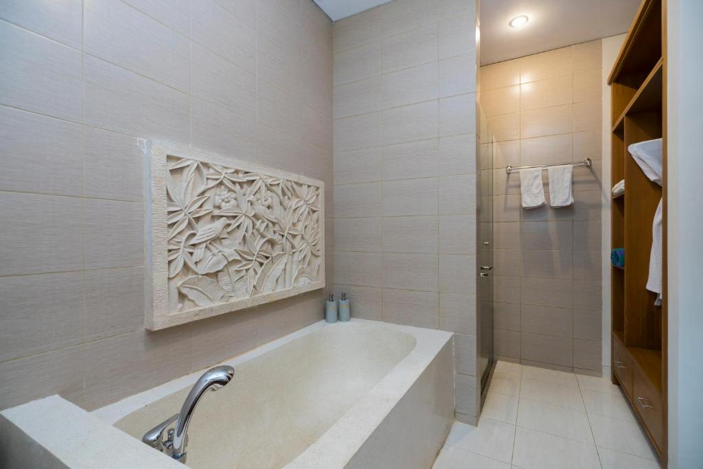 Двухместный (Улучшенный двухместный номер с 1 кроватью или 2 отдельными кроватями), Desak Putu Putera Cottages