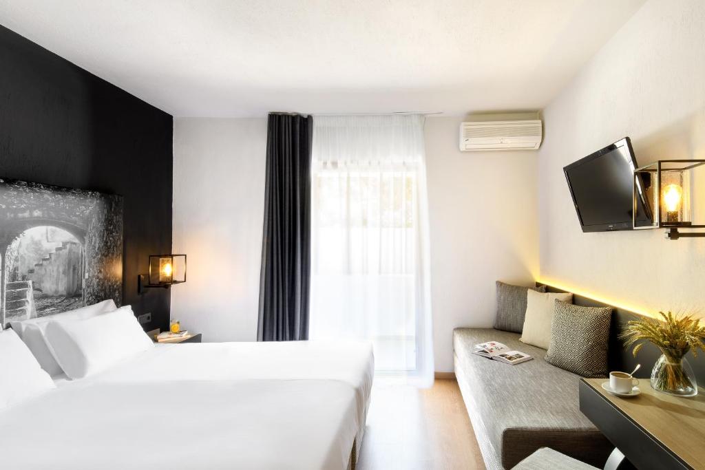 Двухместный (Двухместный номер с 1 кроватью или 2 отдельными кроватями, вид на сад) отеля Akrathos Beach Hotel, Уранополис