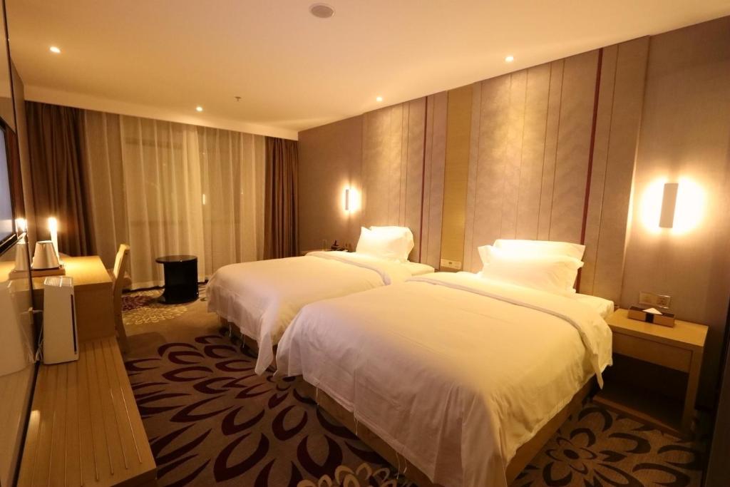 Двухместный (Двухместный номер Делюкс с 2 отдельными кроватями) отеля Lavande Hotel Foshan Yiwu Commodities City, Фошань