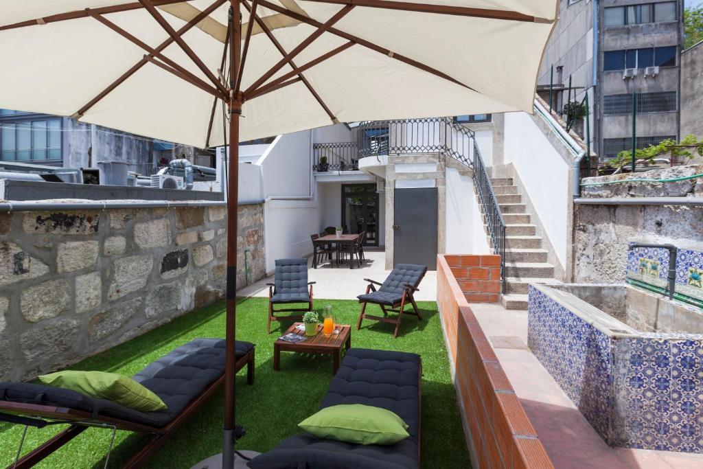 Апартаменты (Апартаменты Делюкс с 2 спальнями, террасой и садом) апартамента BO - Marquês Apartments, Порту