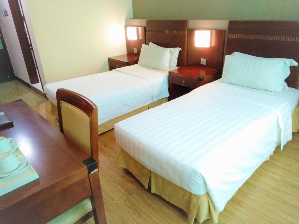 Двухместный (Стандартный двухместный номер с 1 кроватью или 2 отдельными кроватями) отеля Celyn Hotel City Mall, Кота-Кинабалу