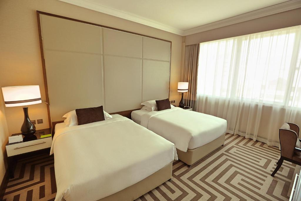 Студио (Класссический номер с 2 отдельными кроватями) апарт-отеля Al Maha Arjaan by Rotana, Абу-Даби