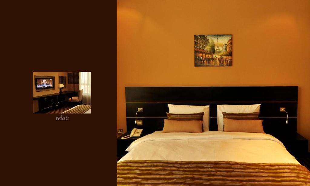 Двухместный (Номер Делюкс с кроватью размера «king-size») отеля Aldar Hotel, Шарджа