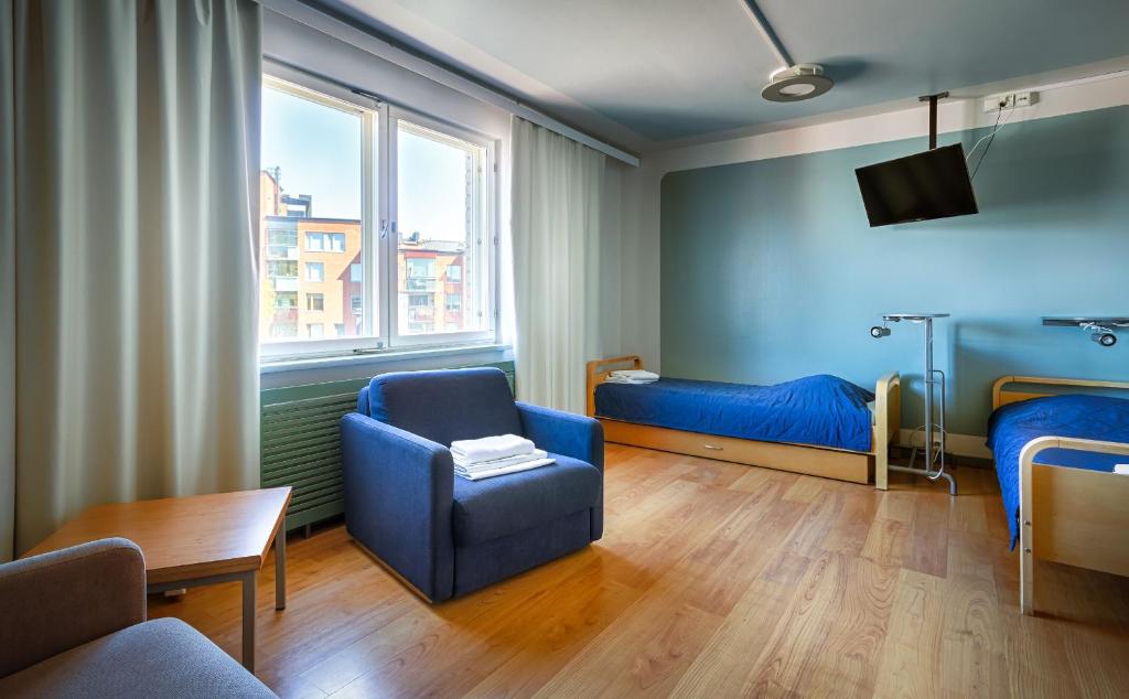 Трехместный (Стандартный трехместный номер с общей ванной комнатой) хостела Eurohostel, Хельсинки