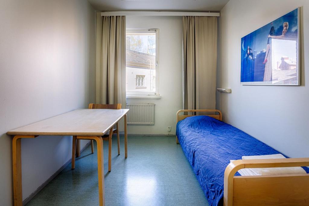 Одноместный (Бюджетный одноместный номер с общей ванной комнатой) хостела Eurohostel, Хельсинки