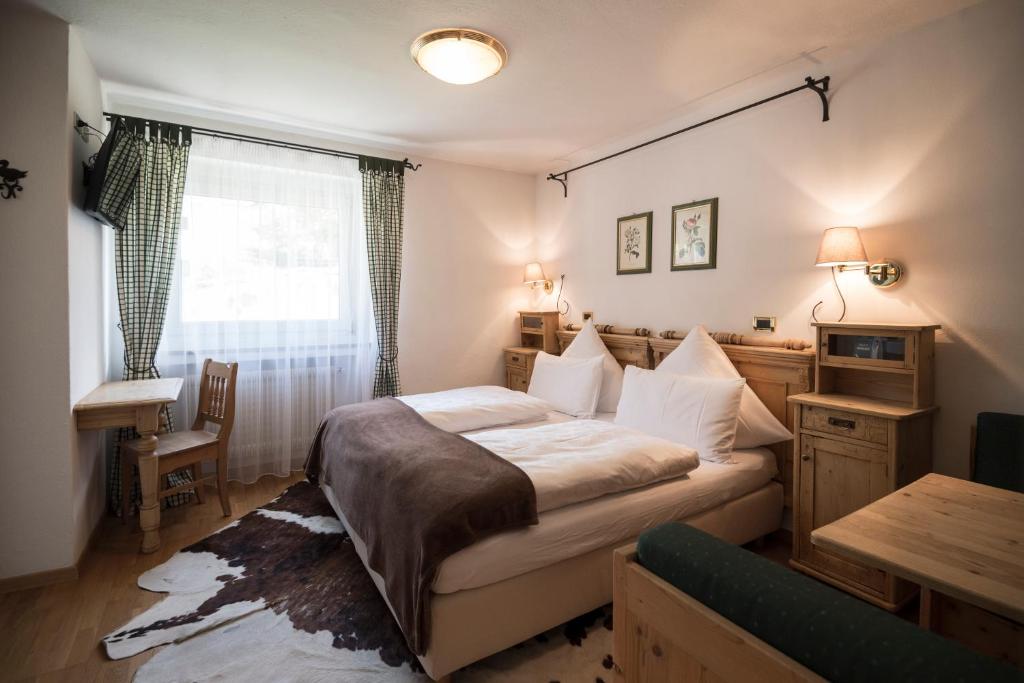 Двухместный (Двухместный номер с 1 кроватью или 2 отдельными кроватями) отеля Chalet Hotel Hartmann - Adults Only, Ортизеи