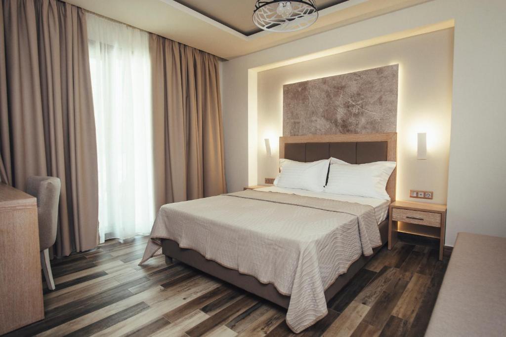 Двухместный (Двухместный номер с 1 кроватью, вид на сад) апарт-отеля Psili Ammos Seaside Luxury Rooms, Астрис