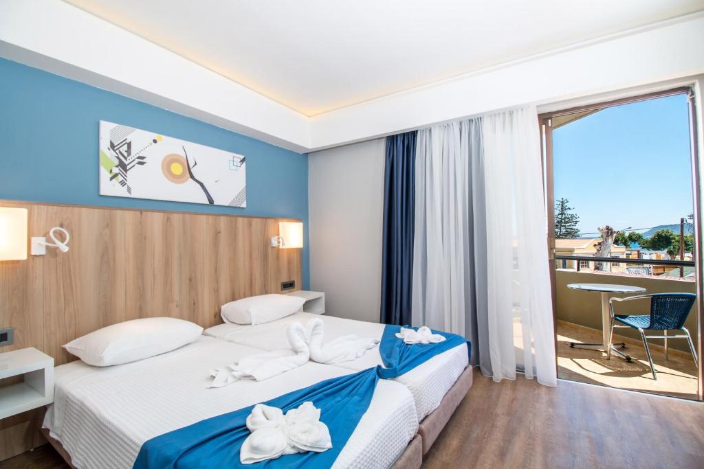 Двухместный (Улучшенный двухместный номер с 1 кроватью или 2 отдельными кроватями) отеля Sunny Days Apartments Hotel, Иксиа