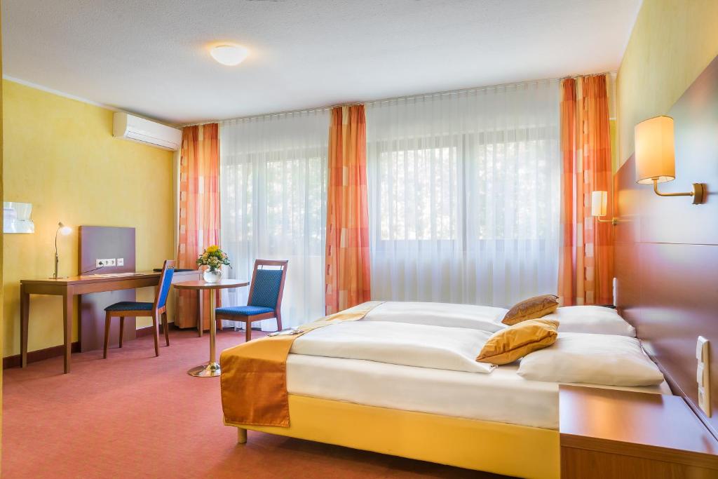 Двухместный (Улучшенный двухместный номер с 1 кроватью) отеля Novum Hotel Rega Stuttgart, Штутгарт