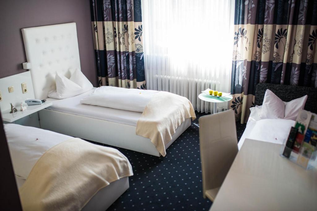 Трехместный (Трехместный номер) отеля Hotel Domizil, Ингольштадт