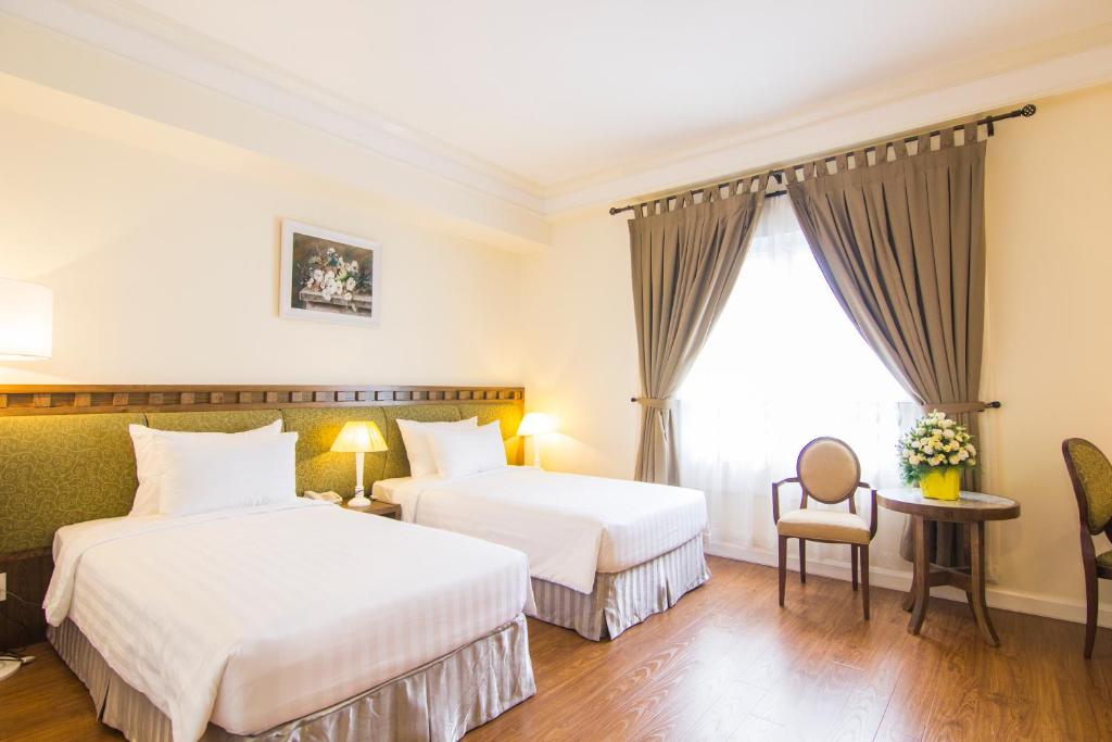 Двухместный (Улучшенный двухместный номер с 2 отдельными кроватями) отеля Phoenix Hotel Vung Tau, Вунгтау