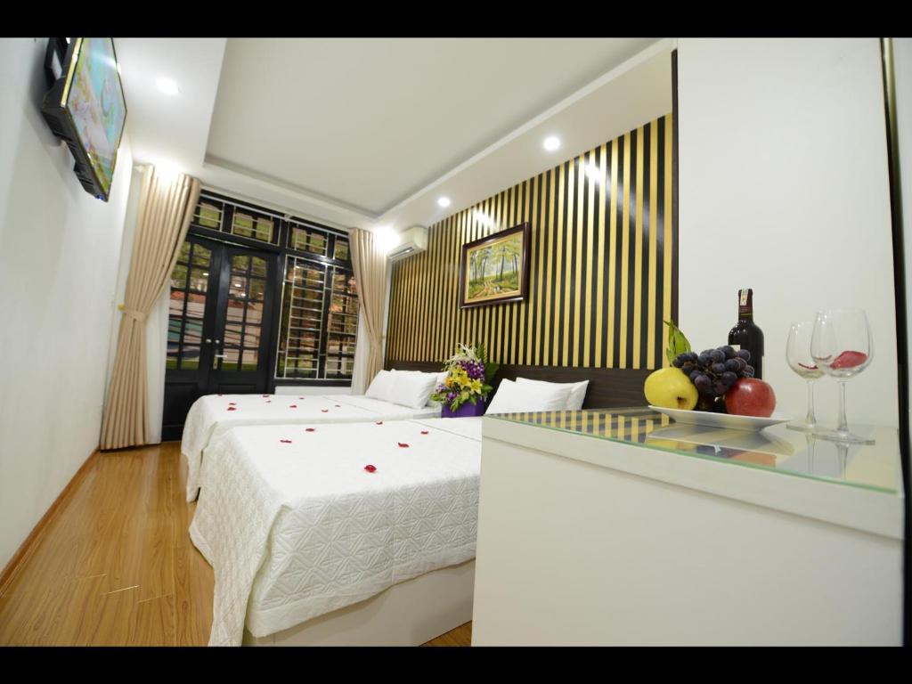Двухместный (Двухместный номер Делюкс с 2 отдельными кроватями) хостела Hanoi Golden Hostel, Ханой