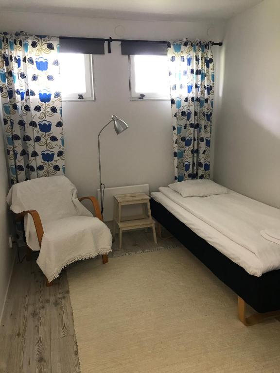 Одноместный (Бюджетный одноместный номер с общей ванной комнатой) хостела Fjord Hostel Rooms, Люсечиль