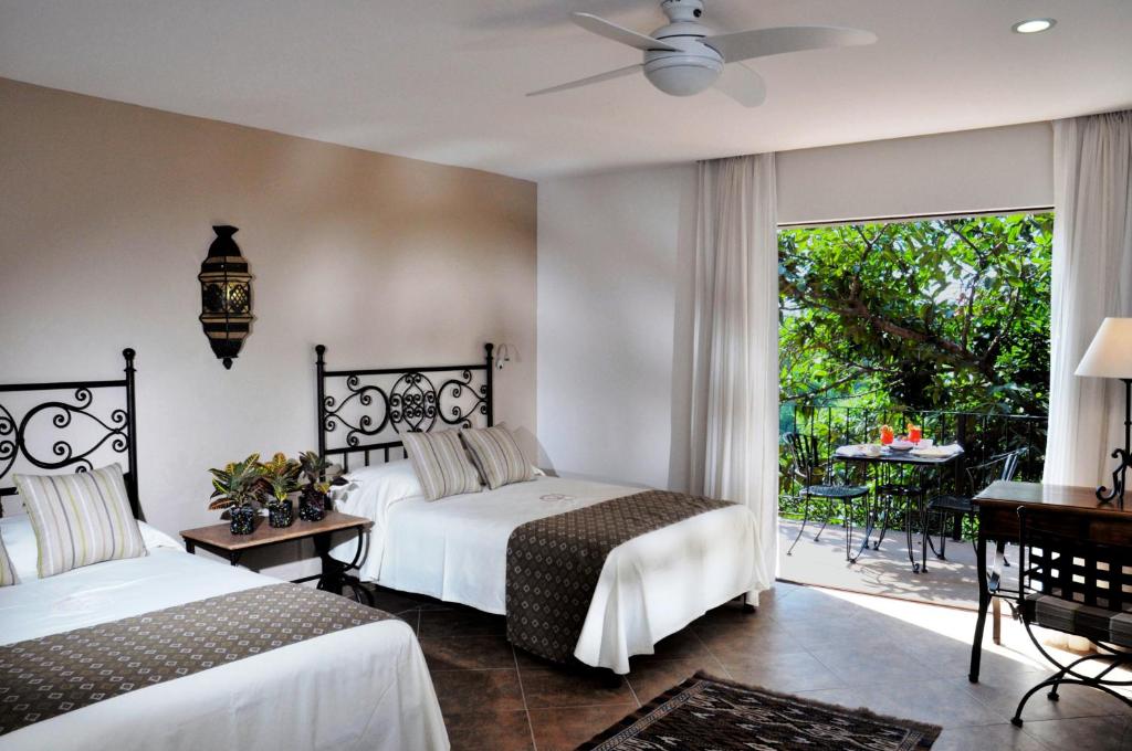 Двухместный (Двухместный номер Делюкс с 1 кроватью и балконом) отеля Hotel & Spa Hacienda de Cortés, Куэрнаваки