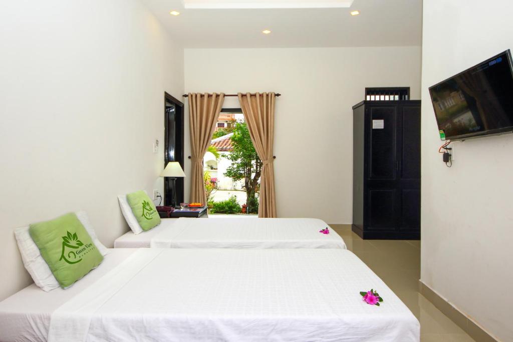 Двухместный (Двухместный номер Делюкс с 2 отдельными кроватями) семейного отеля Hoi An Green View Homestay & Villa, Хойан