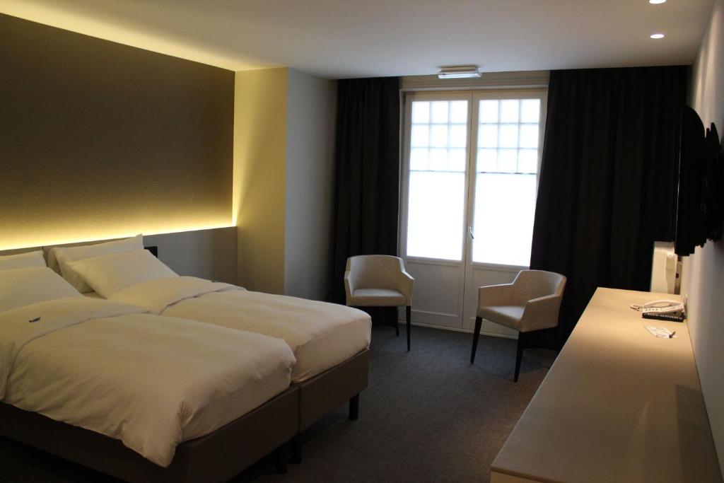 Двухместный (Улучшенный двухместный номер с 1 кроватью и балконом) отеля Hotel Astel, Де-Хаан