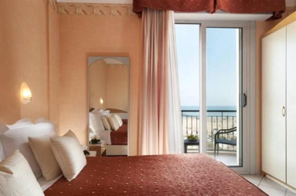 Двухместный (Двухместный номер с 1 кроватью или 2 отдельными кроватями) отеля Hotel Ambra, Римини
