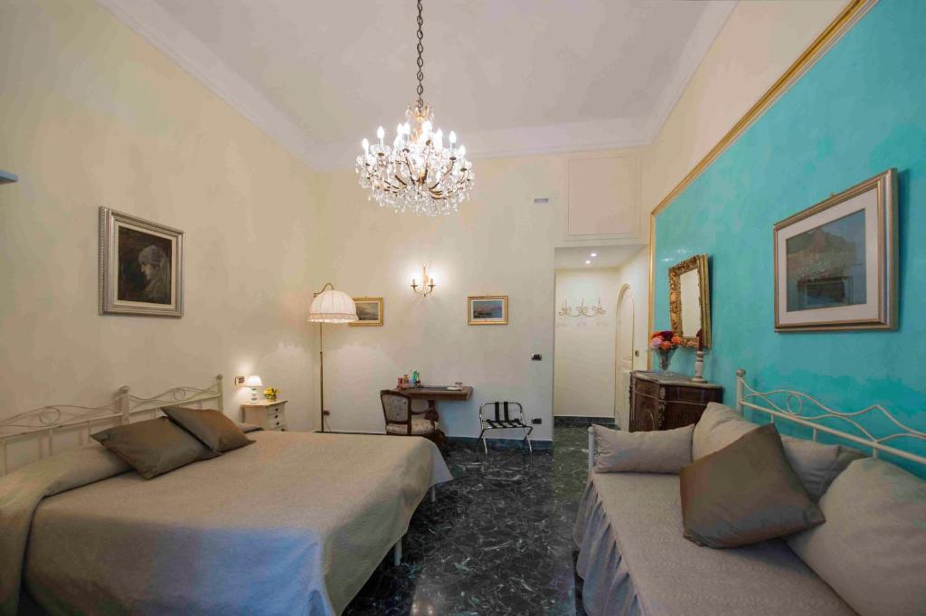 Четырехместный (Четырехместный номер) отеля B&B Residenza Via Dei Mille, Неаполь