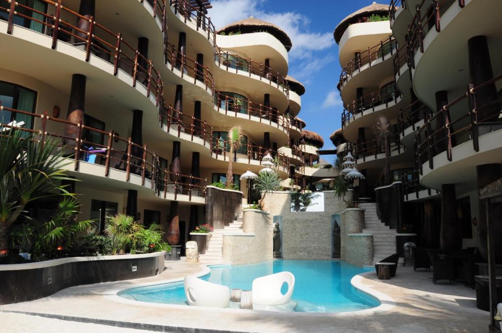 Четырехместный (Люкс с 2 спальнями и частичным видом на море - Пентхаус) апарт-отеля El Taj Oceanfront and Beachside Condo Hotel, Плая-дель-Кармен