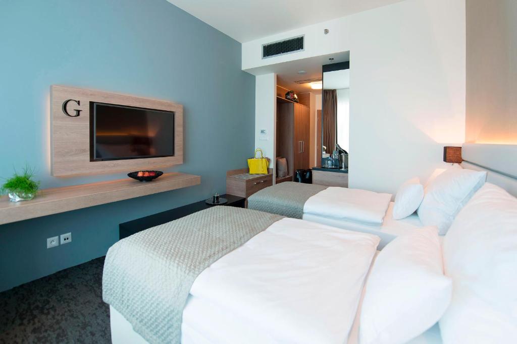 Двухместный (Стандартный двухместный номер с 1 кроватью или 2 отдельными кроватями) отеля Grid Hotel, Брно