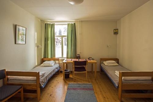 Двухместный (Двухместный номер эконом-класса с 2 отдельными кроватями и общей ванной комнатой) отеля Valamon Luostari, Хейнявеси
