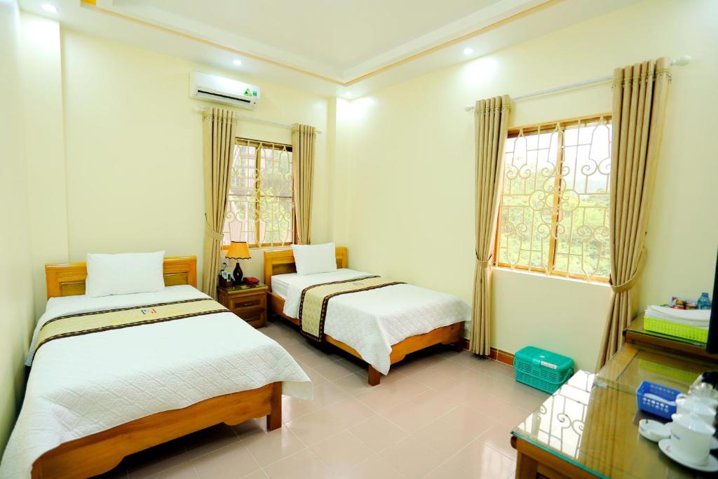 Двухместный (Двухместный номер Делюкс с 2 отдельными кроватями) отеля Huy Hoan Hotel, Хазянг
