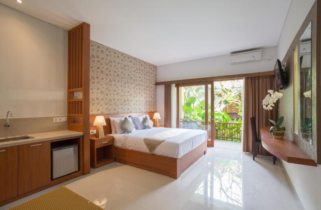 Двухместный (Двухместный номер-студио Делюкс с 1 кроватью или 2 отдельными кроватями) отеля Grand Sehati & Spa, Ubud, Убуд
