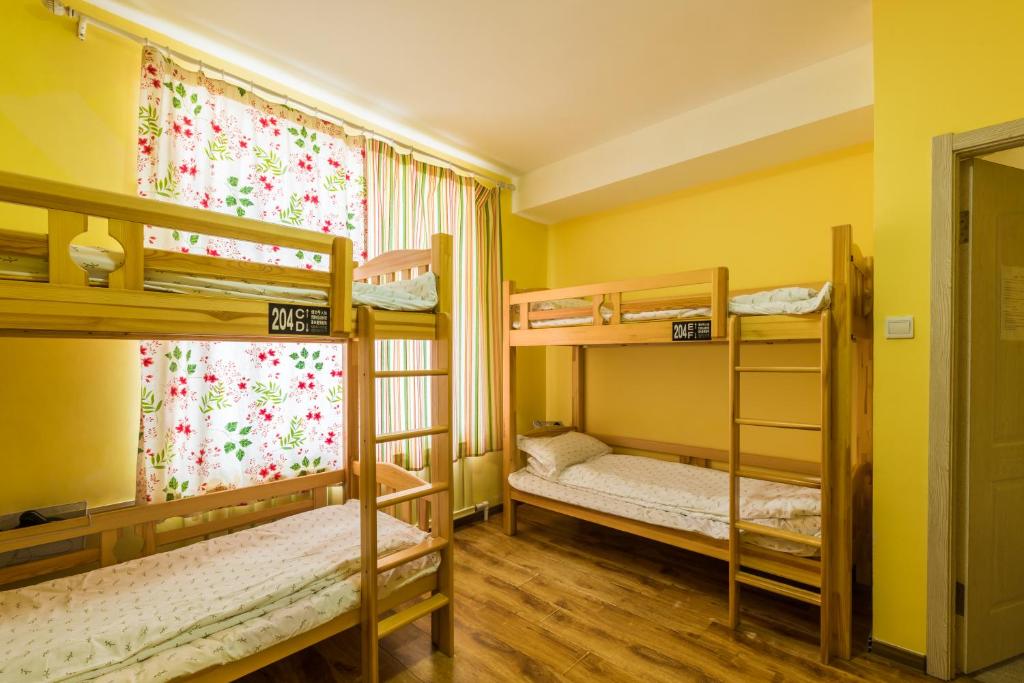 Номер (Кровать в общем номере для женщин с 4 кроватями) хостела Dalian Buzz Light Year Youth Hostel, Далянь