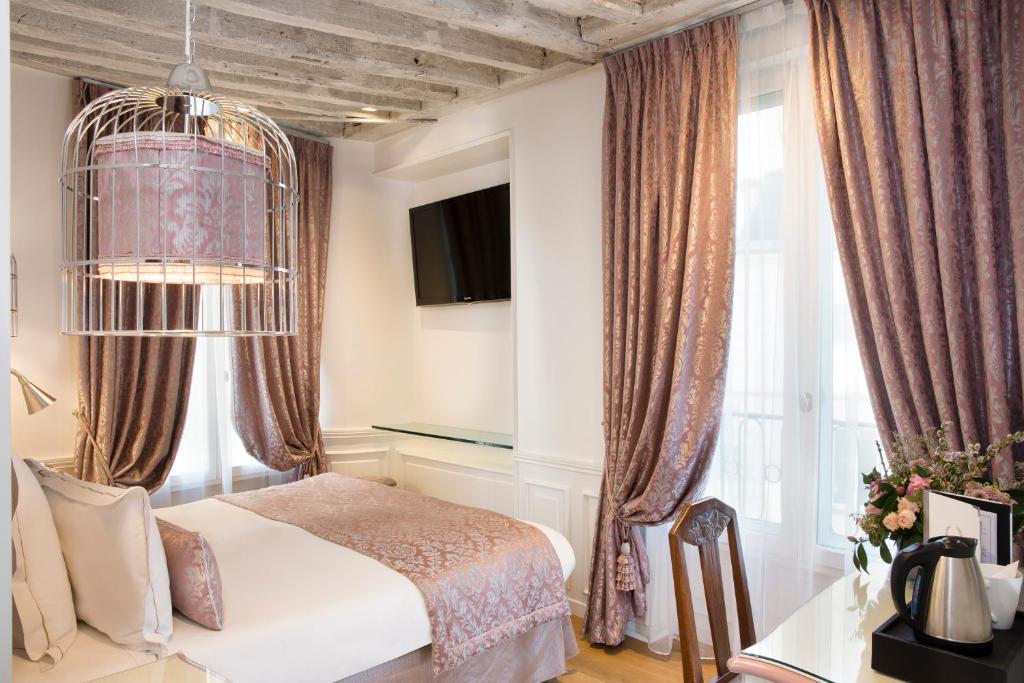 Двухместный (Двухместный номер Делюкс с 1 кроватью и гидромассажной ванной) отеля Académie Hôtel Saint Germain, Париж
