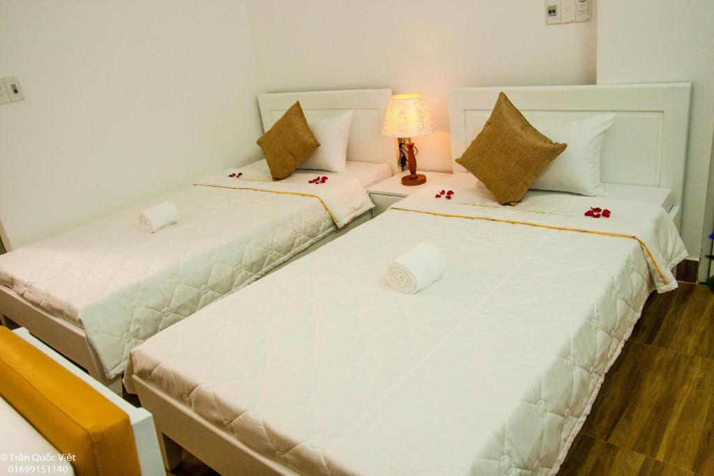 Двухместный (Стандартный двухместный номер с 2 отдельными кроватями) хостела Sunshine Hostel Hue, Хюэ