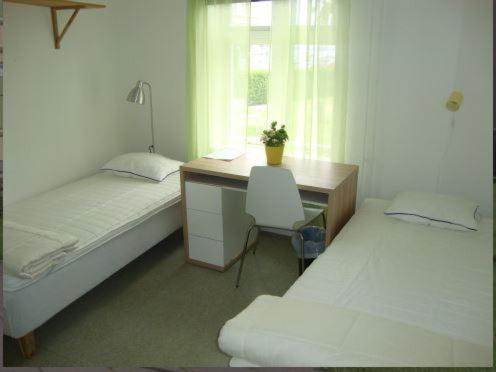 Двухместный (Двухместный номер с 2 отдельными кроватями) хостела Kalmar Sjömanshem, Кальмар