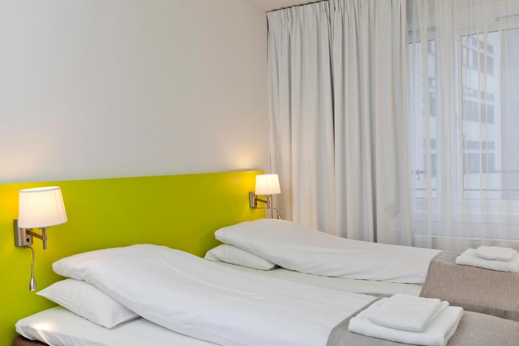 Двухместный (Стандартный двухместный номер с 2 отдельными кроватями) отеля Thon Hotel Munch, Осло