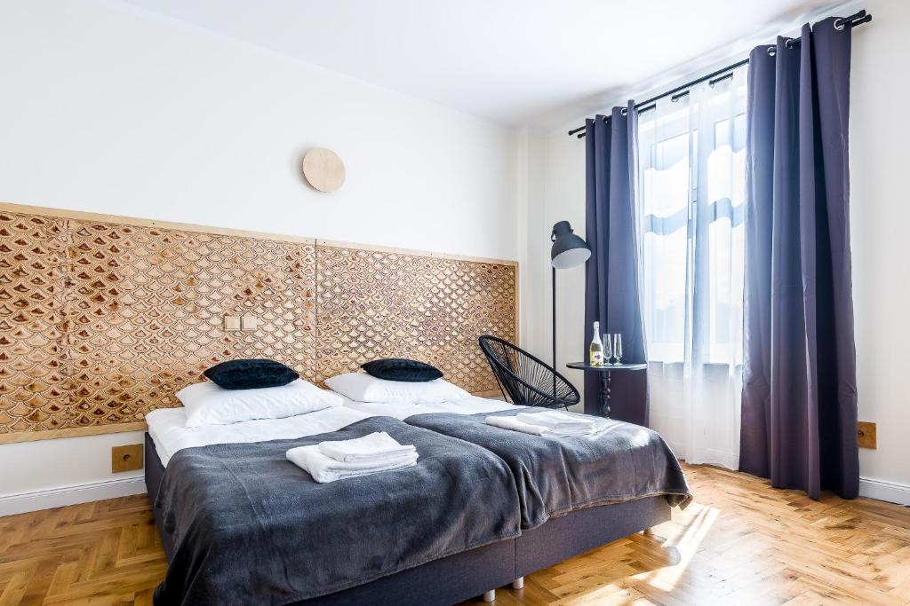 Двухместный (Улучшенный двухместный номер с 1 кроватью или 2 отдельными кроватями и дополнительной кроватью) апартамента aparthotel kamienica, Пуцк