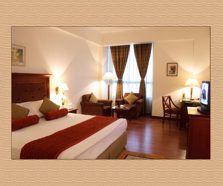Двухместный (Улучшенный двухместный номер с 1 кроватью или 2 отдельными кроватями) отеля Hotel City Park with pool, Нью-Дели